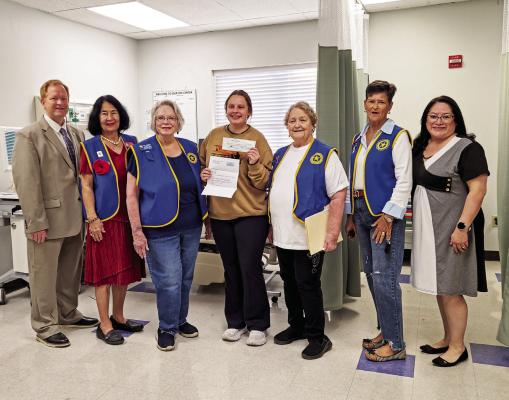 Sienna Campbell was presented with a scholarship check last Thursday from the American Legion Women’s Auxiliary in the amount of $500. On hand for the presentation is Dean of the College of Health Sciences, Dr. Dean Culpepper, Sarah Gluck, Sara Herman, Sienna Campbell, Nancy McAnally, Judy Stokes, and Minerva Gonzales. Photo by Kara Gerbert