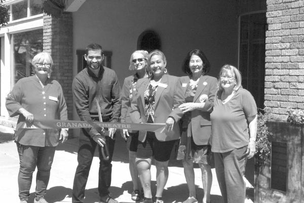 The Granada Theatre held its grand opening and ribbon cutting this past Saturday. The Granada is a local event space, that hosts everything from music to meetings to roller skating. From left are Alpine Ambassador Gerri Davis, owner Benjamin Garcia, ambassadors Rhonda Cole, Eva Olivas, Sara Bow Gluck, and Sheila Johnson. Photo by Joh Covington