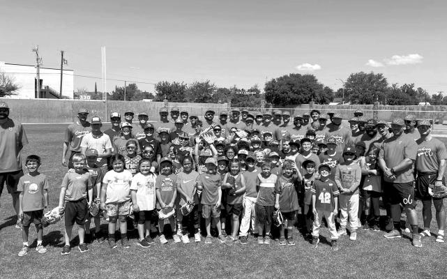 Area kids took to Kokernot Field last Tuesday morning to participate in the Alpine Cowboys’ annual baseball camp. Participants worked on calisthenics, pitching, batting, and catching, and then followed it up with a water balloon fight against the team and lunch. Courtesy photo