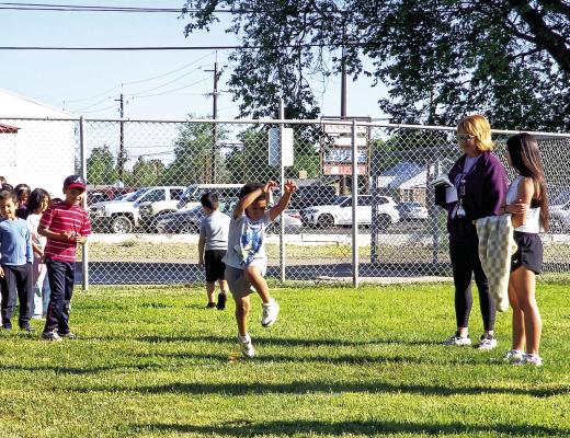 This Alpine Elementary student jumps high over the jump rope during last week’s field day event. Photo by Kara Gerbert