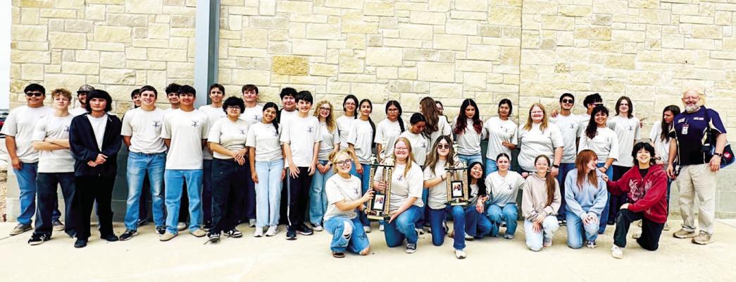 The Alpine Fightin’ Buck Band poses with the trophies they received last month at the Bluebonnet Classic Festival. Courtesy photo