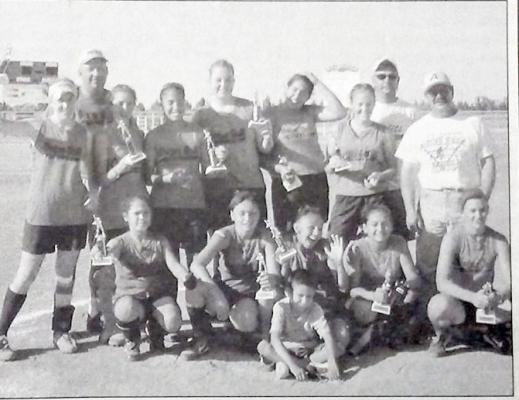 July 24, 2003 — The 14 and Under BBASAAll-Star team won first place at the Monahans tournament July 11-12. Standing left to right: Micheala Davis, Coach Mo Morrow, Victoria Ruiz, Cariza Mendoza, Emily Morrow, Cassy Gonzales, Hannah Dodson, Coach George Salgado, and Coach Bret Collier. Kneeling left to right: Kayla Urias, Jennifer McGuire, Trisha Salgado, Mary Nunez, and Morgan Collier. Sitting in front is team mascot George Salgado, Jr.; not pictured: Jackie Hernandez.