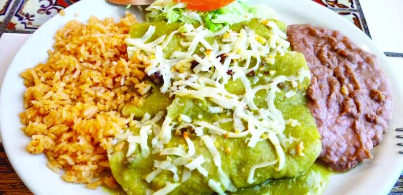 Green enchiladas, Mexican rice, and refried beans. Avalanche photo by Kara Gerbert
