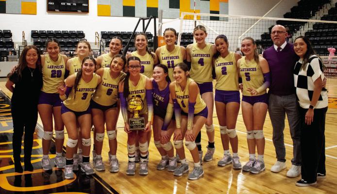 The Alpine Lady Bucks pose with their Bi-District trophy after defeating Coahoma last week. Photo by Alice Saunders