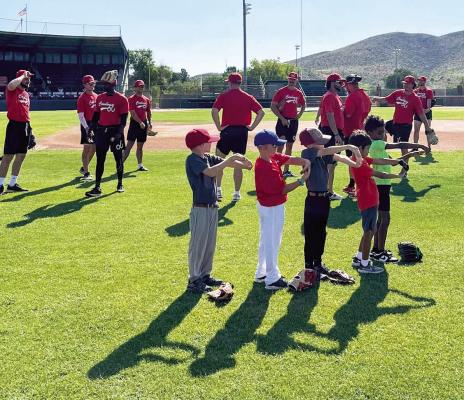 Campers work on fundamentals during last season’s youth baseball camp. Courtesy photo