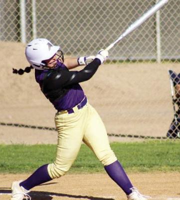 Kody Hawkins slugs one into the outfield in a recent game. Courtesy photo