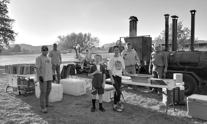 The Alpine FFA held a concession stand to feed everyone after last Wednesday’s homecoming parade. The meal consisted of smoked sausage wraps cooked by the Alpine FFA Boosters, a cookie, a bottle of water, and a bag of chips. Helping out were Bryan Ritchie, Trever Warren, Brody Warren, Ty Ritchie, Micaela Ritchie, T.C. Hawkins, and Mr. Doug Fox. Photo by Kara Gerbert