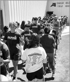 The Alpine Fightin’ Bucks football team traveled to Tornillo last weekend for a district game, and their fellow Bucks gave them a proper sendoff. Photo by Joh Covington