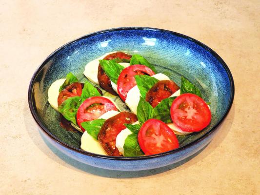 Caprese salad with heirloom and Roma tomatoes. Avalanche photo by Kara Gerbert