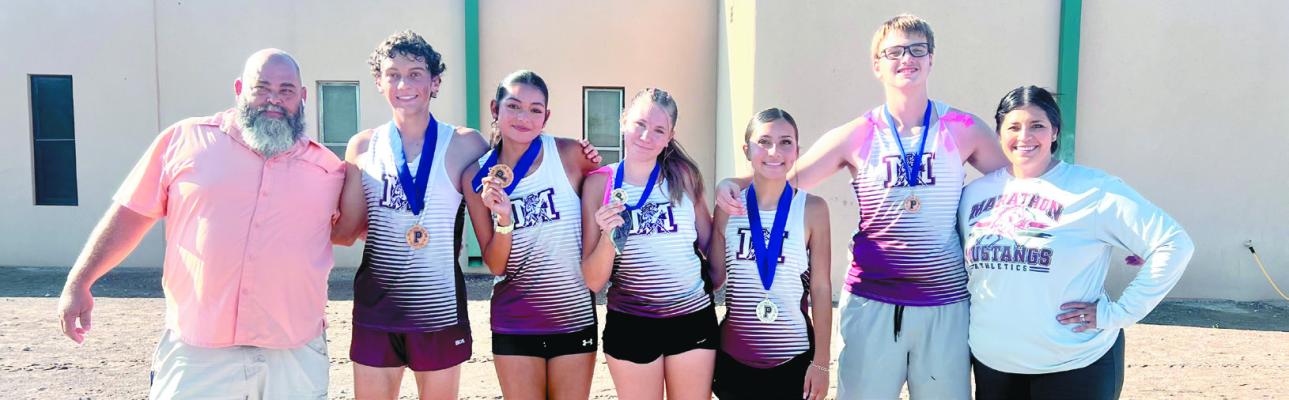 The Mustangs hit the trail in Presidio this past weekend with all the high school runners placing. The team is pictured with Marathon Superintendent Keith Kimbrough on the left and Coach Keana Cobos on the far right. Courtesy Photo