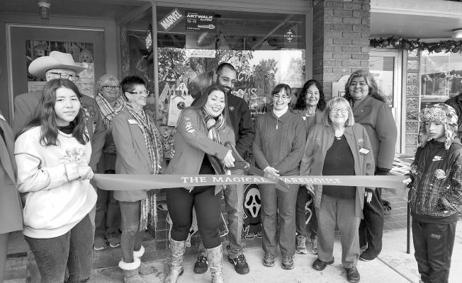 Alpine Ambassadors held a ribbon cutting ceremony for The Magical Warehouse on Saturday. Braving the chilly weather are Debbie Jordan, Jerry Johnson, Geri Davis, Judy Stokes, owner Connie Santillan, Martin Gutierrez, Julie Edwards, and Sheila Johnson. In the back are Sara Bow and Berta Rios-Martinez. Holding the ribbon are Santillan’s children, Alyna Gutierrez and Isaac Gutierrez. Avalanche photo by Kara Gerbert