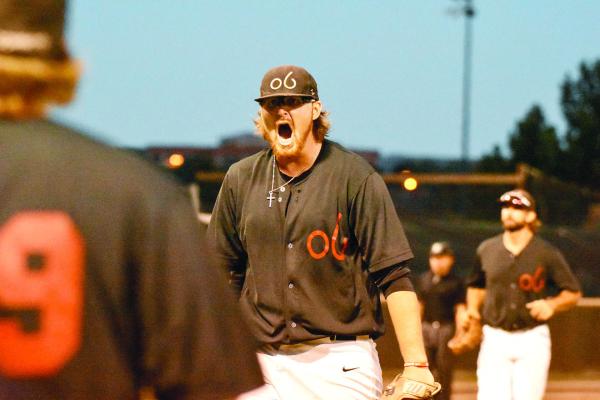 Cowboys starting pitcher Matt Hess gets fired up during his postseason start against the Trinidad Triggers August 4 at Kokernot Field. Hess pitched Alpine to a win and forced a decisive third game. Hess was promoted to the Pioneer League’s Ogden Raptors after the Cowboys’ elimination from the playoffs. Photo by Julie Myers