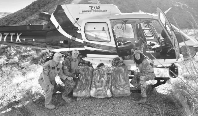 The Texas Department of Public Safety’s Aircraft Operations Division along with Big Bend sector Border Patrol agents stationed out of Van Horn, recently seized three bundles of narcotics worth an estimated street value of just under $500,000. Pictured here on the left are Captain David Riggs, TFO Matt Beard and on the right Staff Lt. James Morris. Courtesy photo