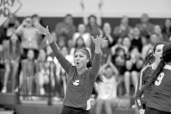 Hope Dominguez celebrates a reception at a recent game