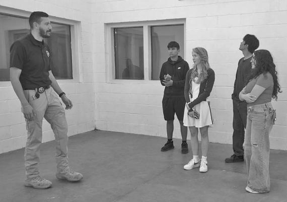 AHS Principles of Law and Public Safety students recently toured the Alpine Police Department and the Brewster County Jail facilities. APD Chief of Police Darrell Losoya partnered with the Brewster County Sheriff’s Offi ce to help the students explore the technologies, equipment, and procedures that go into local law enforcement operations. Courtesy photo