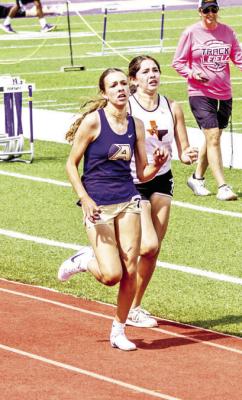 Alpine’s Alice Saunders turns on the afterburners in the girl’s 1600m race this past Saturday at Buck Stadium. Photo by Kara Gerbert