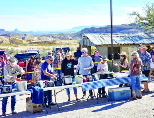 Terlinguans and visitors line up to partake in a “bowl of good luck” at the annual Terlingua Pea-Off held each New Year’s Day in the ghosttown. Photo by Kara Gerbert