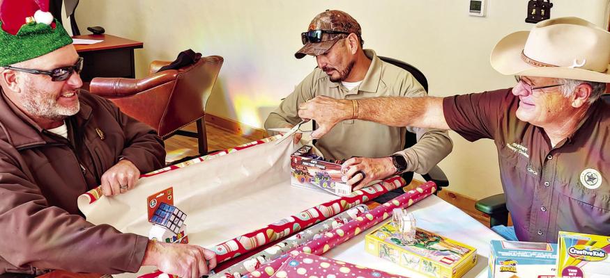 Brown Santa collects toys for needy children