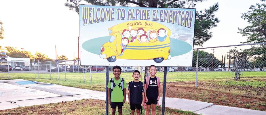 Ayven Loza, Noah Rodriguez, and Melinda Rodriguez are all smiles as they embark on their first day back to school for the 2023-2024 school year. Photo by Kara Gerbert