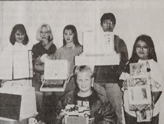 October 13, 1994 – Ginger Elliot’s 8th-grade computer literacy classes recently completed a project on building a computer. Shown with their creations are (back row) Rexann Elliott, Casey Bobbitt, Tiffany Kuenstler, Edward Alvarado, and Nembii Rios. In front is Billy Brumley.