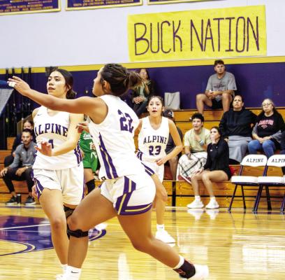 Teamwork makes the dream work as these Lady Bucks continue to improve on communication on the court as well as their fundamentals. Photo by Kara Gerbert