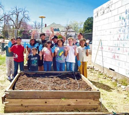 Thanks to the Marfa ISD PTO, these 4th-graders at Marfa Elementary were able to prepare their raised garden beds for their summer gardens. Photo courtesy of Marfa ISD