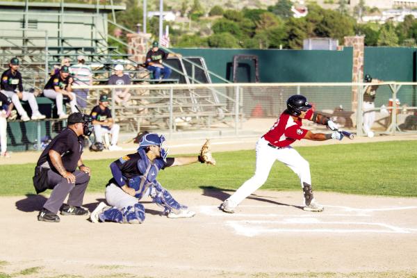 Shortstop Billy Rivera led the Cowboys to their first points on the board with his bunt at the plate last Friday night in the closing game of this season’s first series against the Tucson Saguaros at Kokernot Field. Photo by Kara Gerbert