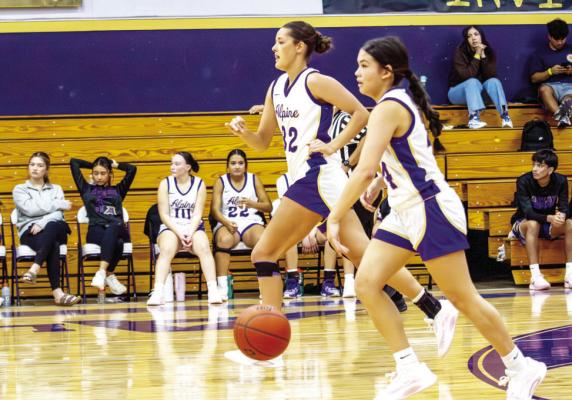 Isabella Shelton and Gyllian Morrisey power towards the basket in the Lady Bucks win over Fort Hancock on Saturday. Photo by Kara Gerbert