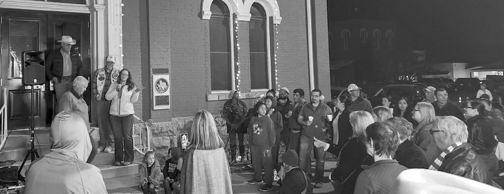 Pct. 2 County Commissioner Sara Colando spoke to the Alpine community on Friday night at the tree lighting ceremony held at the Brewster County Courthouse. Photo by Joh Covington