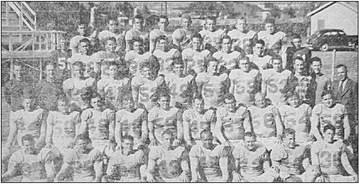 September 26, 1947 Pictured here are all the members of the 1947 Lobo football squad of Sul Ross State University and their coaches. They are photographed on Jackson Field, and behind the team can be seen the Sul Ross Campus, buildings, and the notable Bar-SR-Bar emblem on the university hill.