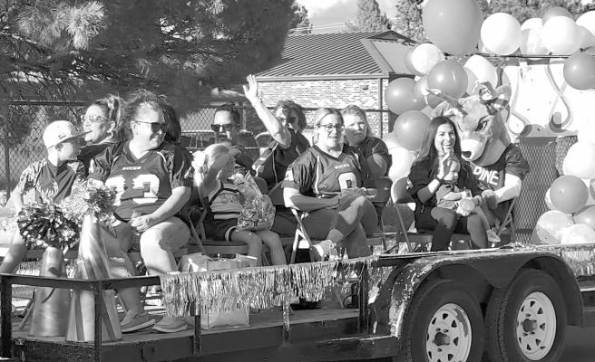 Parading with purple and gold