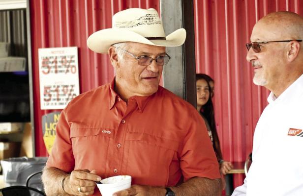 Brewster County Sheriff Ronny Dodson talks to Big Bend Telephone’s CEO Rusty Moore during the recent law enforcement appreciation breakfast, focusing on how telecommunications internet providers can help mitigate sex trafficking. Photo courtesy of RasorCreative