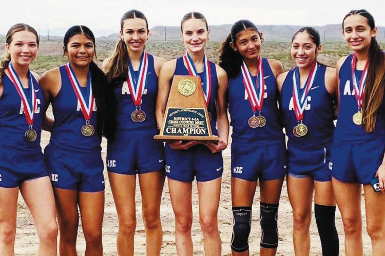 The Alpine Lady Buck cross-country team took the 4-3A District Championship in Presidio last week, with these seven young ladies all placing in the top 10. From left: Hallie Wood (2nd), Zoe Munoz (5th), Alice Saunders (10th), Molly Garrett (6th), Iliana Dominguez (8th), Andynne Ramirez (4th), and Eivary Mercado (1st). Courtesy Photo