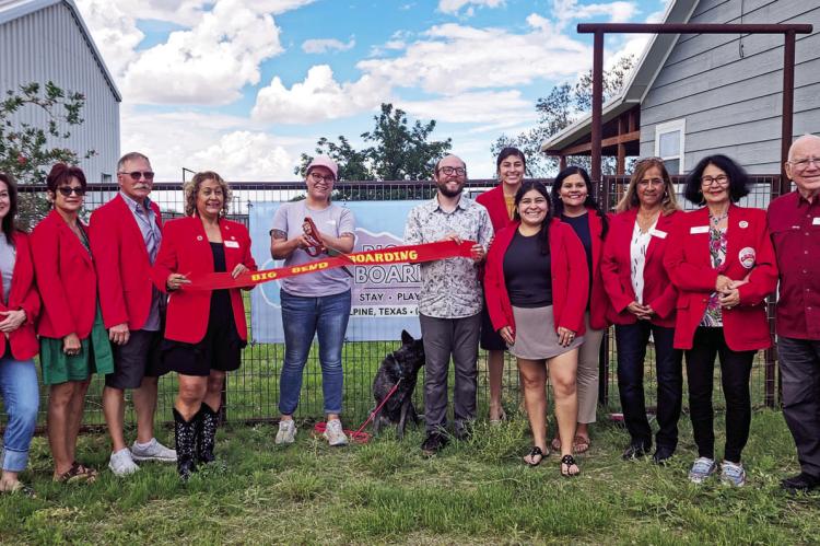 The Alpine Ambassadors welcomed Big Bend Boarding to the city on Saturday afternoon. Rachael Connally, Luna the Blue Heeler, and Alex Toder are the owners of this new animal boarding facility located at 504 Tom Lackey Lane. Photo by Kara Gerbert