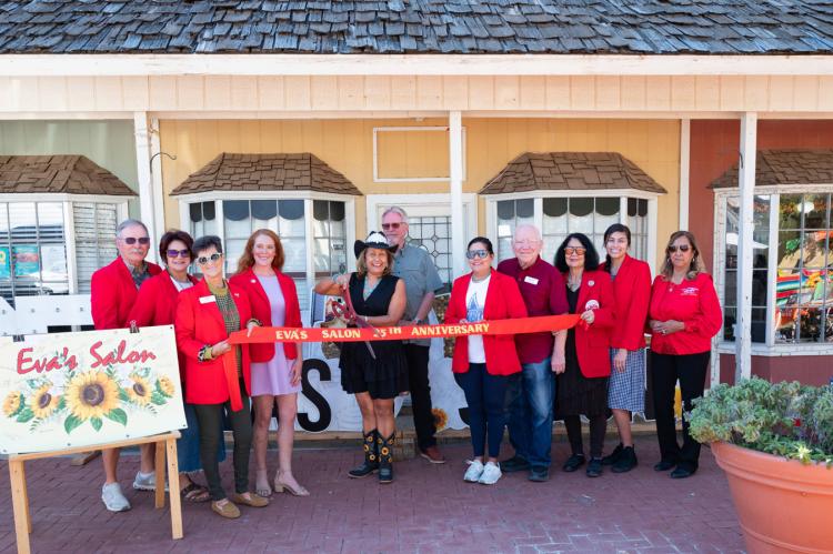 The Alpine Ambassadors were on hand on Sunday to celebrate the 25th anniversary of Eva’s Salon. Photo by Teresa Huckaby