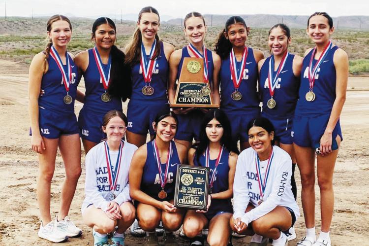 The Runnin’ Lady Bucks varsity cross country team brought home its third consecutive district title in Presidio last week. Courtesy Photo