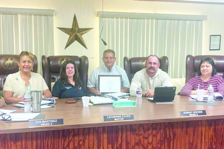 The Alpine City Council is pictured here with Alpine City Manager Henry Arredondo (center), who poses with his certificate for completing the Texas Certified Public Manager coursework through Texas State University. This is a nationally recognized credential designed for public sector officials focusing on strengthening ethical leadership, improving managerial effectiveness, and enhancing the quality of public administration. Photo courtesy of Abel Hinojos