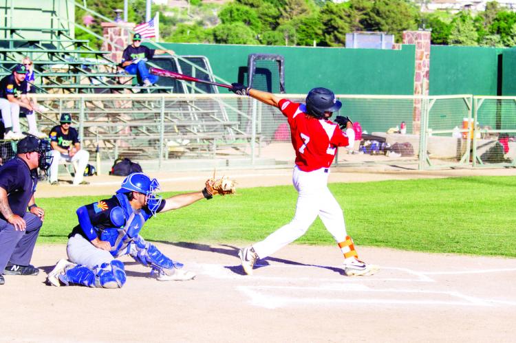 The Cowboys’ Luke Hyzdu takes a swing during Alpine’s homestand against the Saguaros. Photo by Kara Gerbert