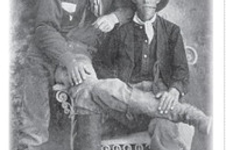 1900s Cowboys John Henderson and Roy Stillwell (seated)