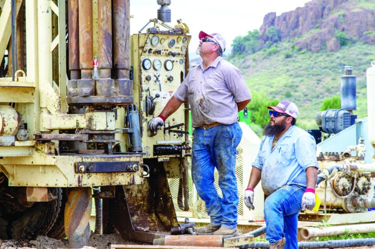 Alt Text The new Roberts #4 city well is well on its way, with more than 160 feet drilled so far. Thomas Skinner and Anthony Marquez Jr. are pictured here running the drilling unit. The four-man team from Skinner’s Well Service was hard at work on the new well last Monday afternoon when the Avalanche was invited for a site visit from Alpine City Manager Henry Arredondo and City of Alpine Water Utilities Director Mike Maciaz. The new well is being drilled approximately 40-50 feet from the now plugged
