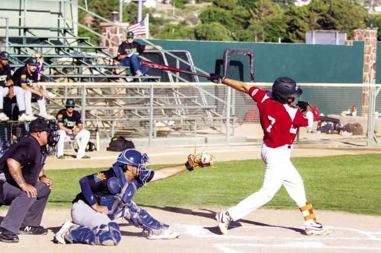 Luke Hyzdu is pictured earlier in the season at home against the Saguaros. Hyzdu continues to impress at the plate, collecting hits for the Cowboys. Photo by Kara Gerbert