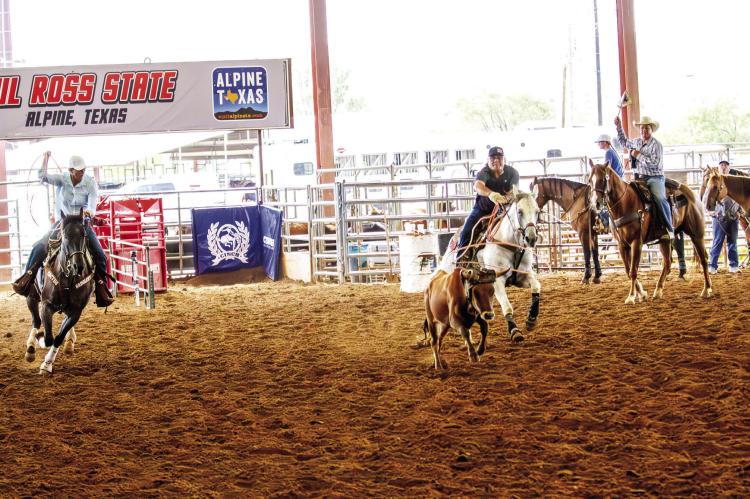 Annette Stahl and Pete Galvan leave the roping boxes last Friday morning during the 12-slide roping as part of the Sul Ross ANRS and Rodeo Exes weekend. Jeff Davis County Judge and Sul Ross alum Judge Curtis Evans was the arena judge. All proceeds from the events will go towards Rodeo and Ag scholarships, with a portion of the proceeds used to create the ANRS and Rodeo Exes Memorial Scholarship Fund, a Texas State University Endowment which will honor the Class of 1981’s Larry Byrum during its first year. 