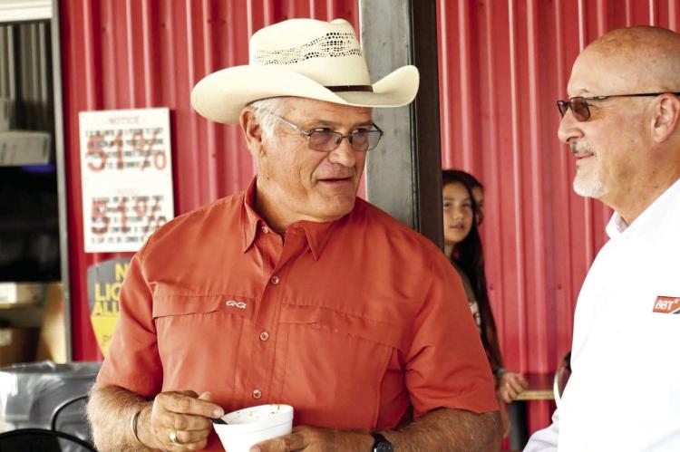 Brewster County Sheriff Ronny Dodson talks to Big Bend Telephone’s CEO Rusty Moore during the recent law enforcement appreciation breakfast, focusing on how telecommunications internet providers can help mitigate sex trafficking. Photo courtesy of RasorCreative