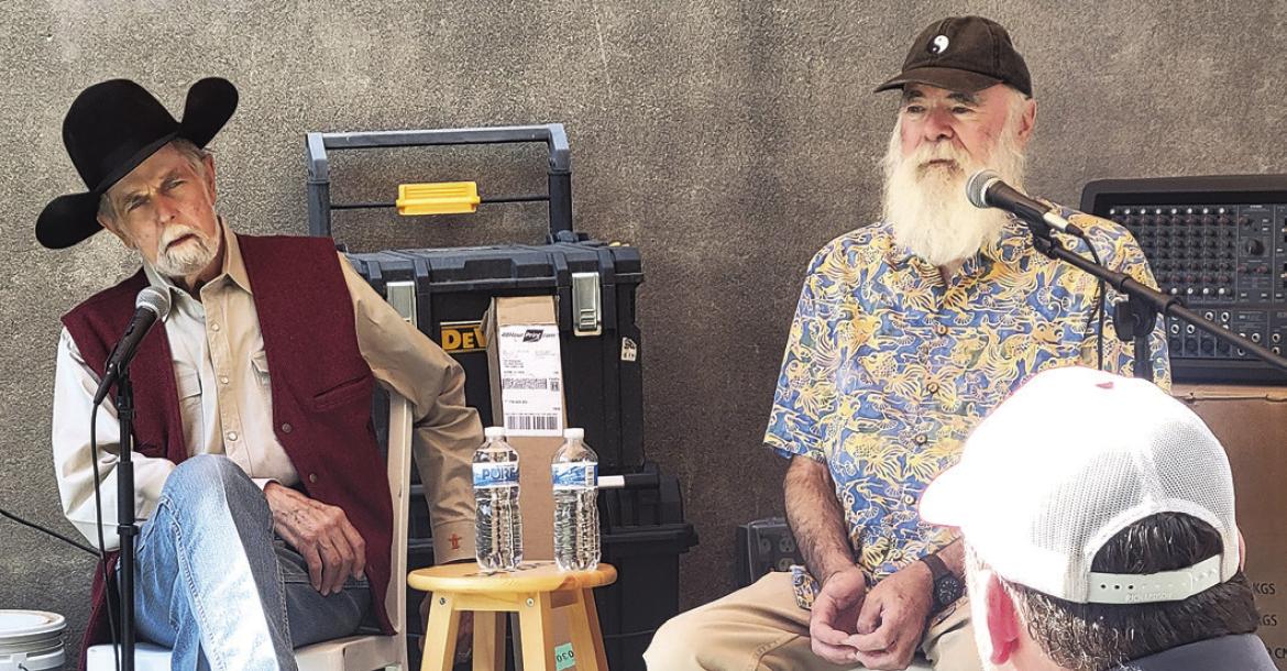 Master luthiers Michael Stevens (left) and Michael Turko answer questions from Far West Guitar’s owner Will Snodgrass during a Saturday speaking event in the courtyard at Far West Guitars as part of Viva Big Bend and the Smithsonian Institution’s Spark! Places of Innovation program. Photo by Kerry Laird