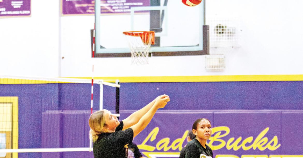 Lady Buck Kacy Hawkins works on her bump return form, as fellow teammate Haily Adams looks on. Photo by Kara Gerbert